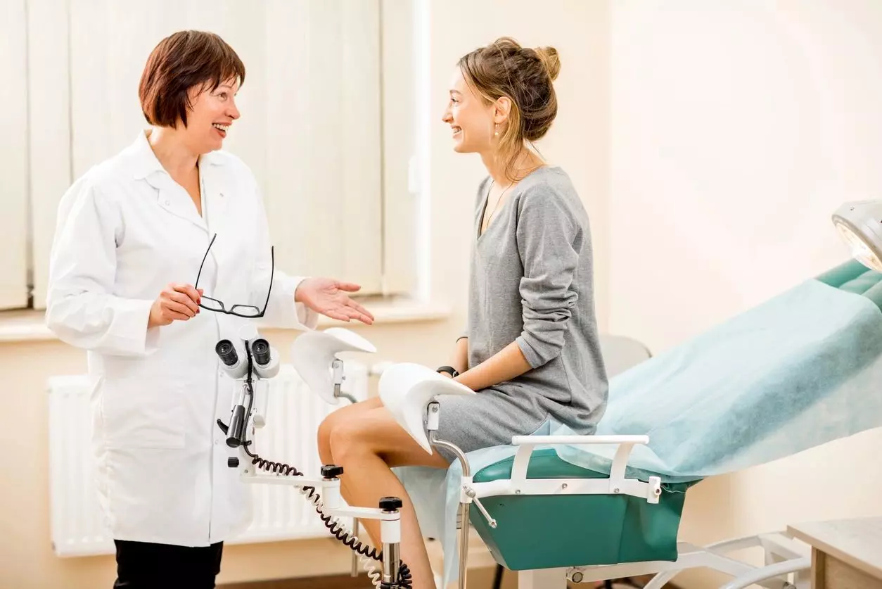 A doctor talking to a patient